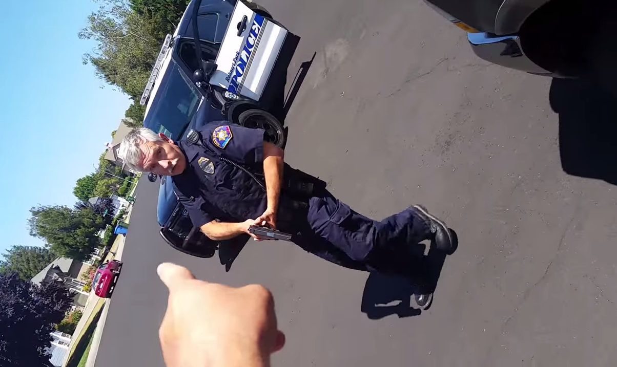 Policeman Pulls Gun On Man Filming In Front Of His House (Welcome To The New Wild West)